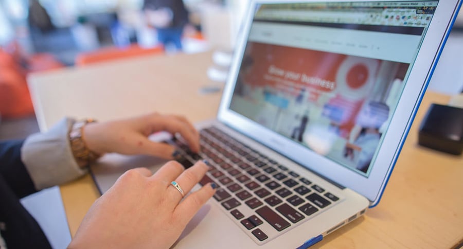 Picture of woman typing on computer